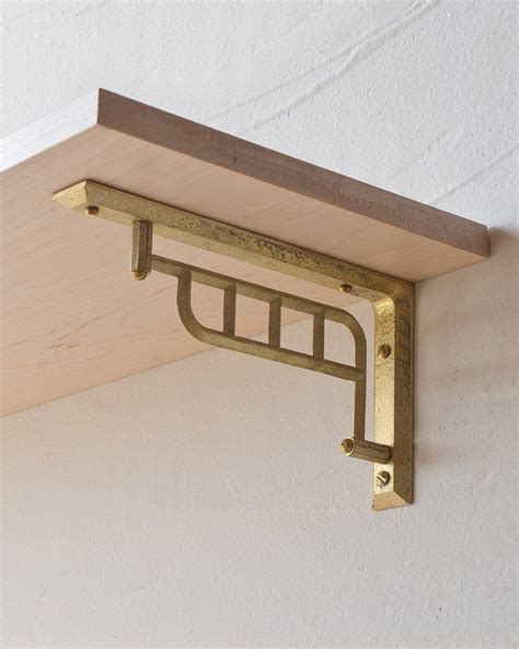 single slot metal shelf bracket|traditional slotted shelf bracket shelves.